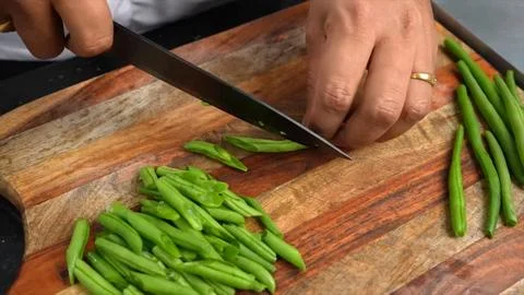 Some Yardlong beans cutting on board Stock Photos
