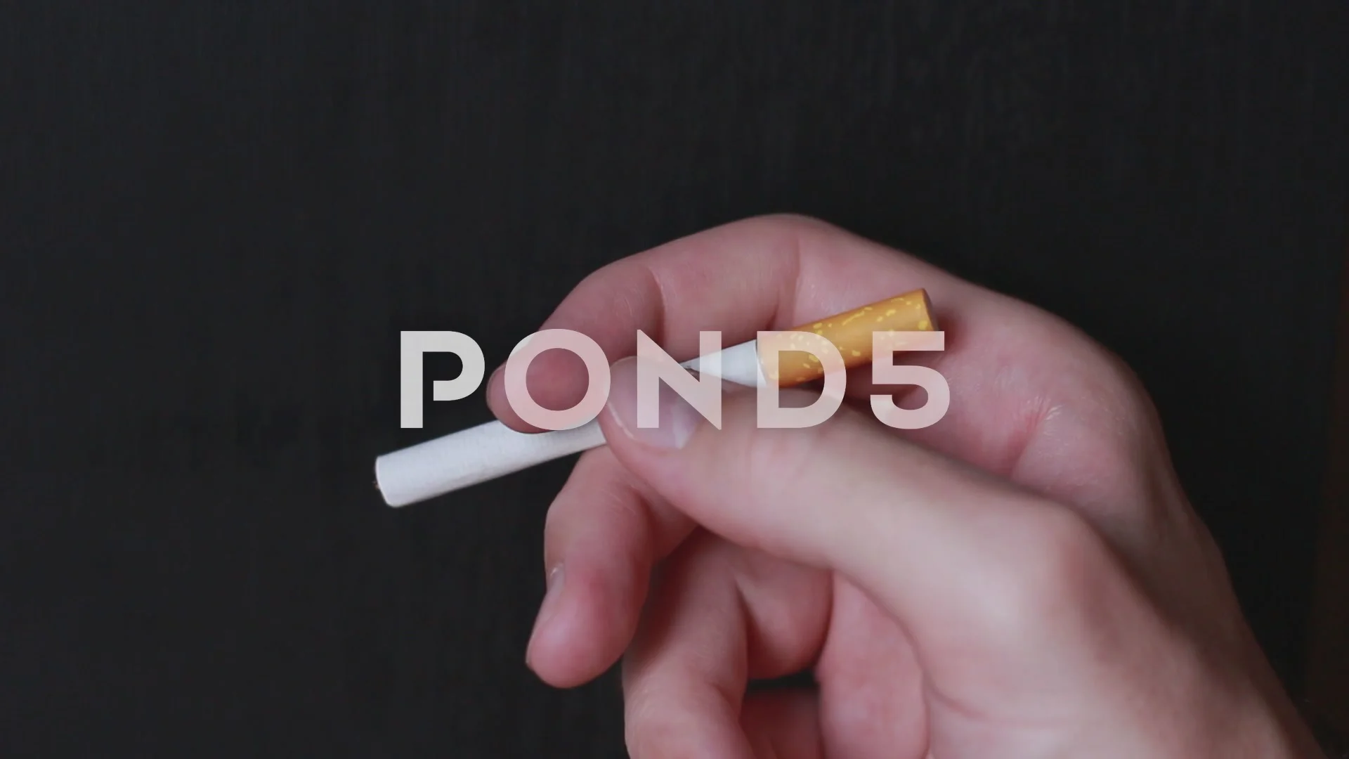 Somebody fingering a cigarette | Stock Video | Pond5