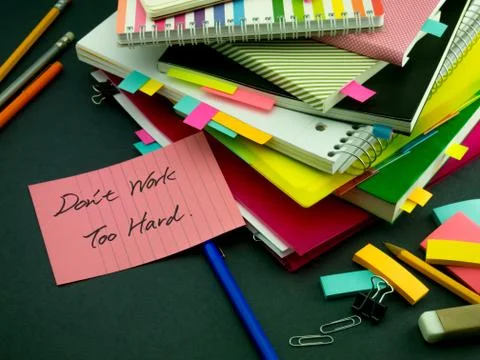 Somebody Left the Message on Your Working Desk; Don't Work Too Hard Stock Photos