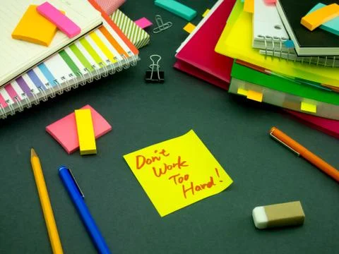 Somebody Left the Message on Your Working Desk; Don't Work Too Hard Stock Photos
