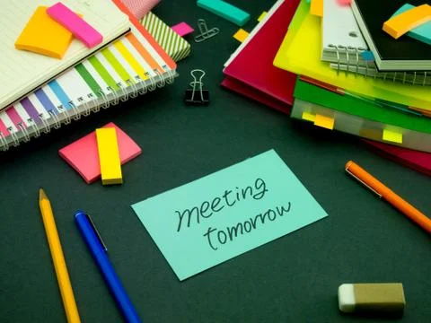 Somebody Left the Message on Your Working Desk; Meeting Tomorrow Stock Photos