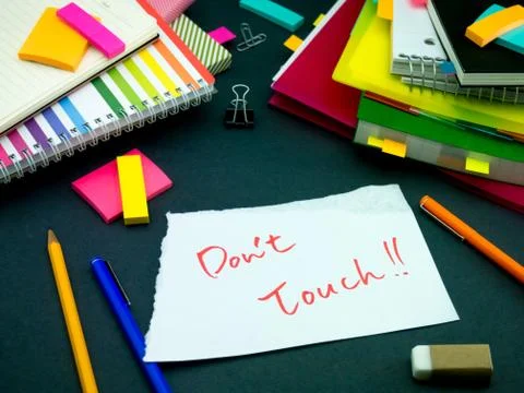 Somebody Left the Message on Your Working Desk; Don't Touch Stock Photos