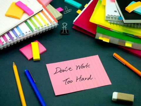 Somebody Left the Message on Your Working Desk; Don't Work Too Hard Stock Photos