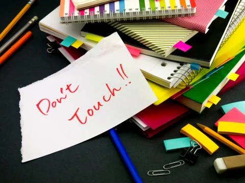 Somebody Left the Message on Your Working Desk; Don't Touch Stock Photos