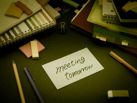 Somebody Left the Message on Your Working Desk; Meeting Tomorrow Stock Photos