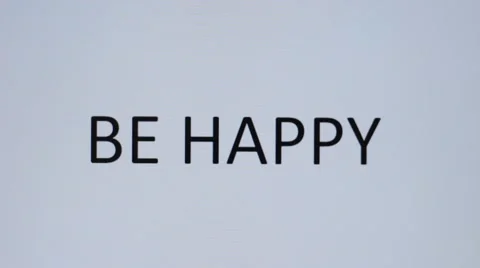 Somebody prints "Be happy" on a computer Stock Footage 66756362