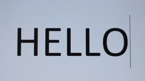 Somebody prints "Hello" on a computer 動画素材 66756190