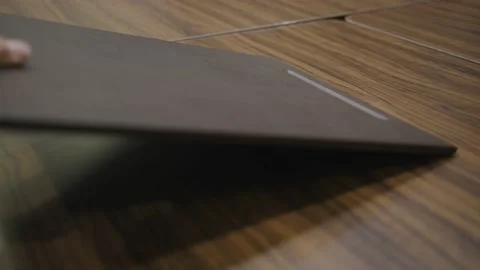 Somebody is putting the tablet on the office table Stock Footage 221697528