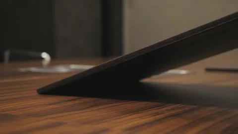 Somebody is putting the tablet on the office table Vídeos de archivo 223001356
