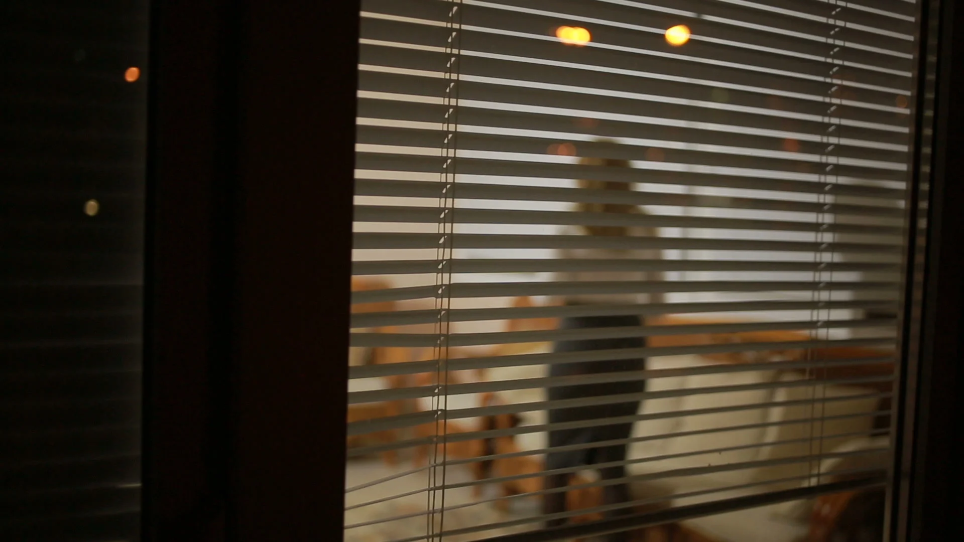 spying teen through window