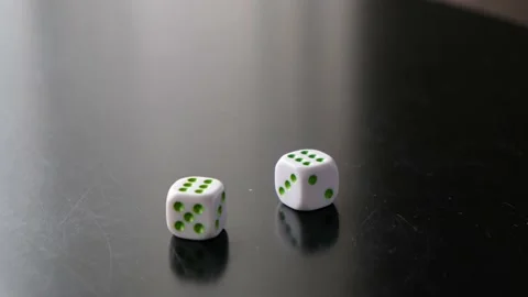 Somebody throwing the dice on black table, playing game, casino, play roulette Stock Footage 143709447