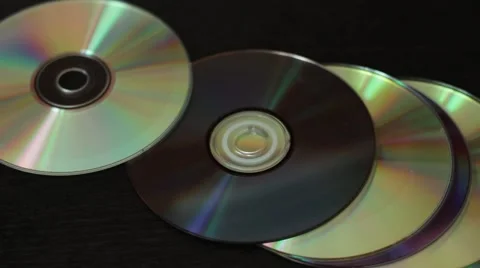 Somebody throws CD discs on a table Video stock 66756494