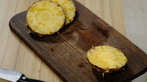 Someone ate a pineapple and put the peel 스톡 동영상 127291611