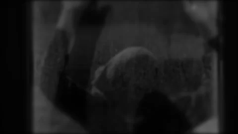 Someone breaks and knocks with fists or hands on the door or window, bandit Stock Footage 247978600
