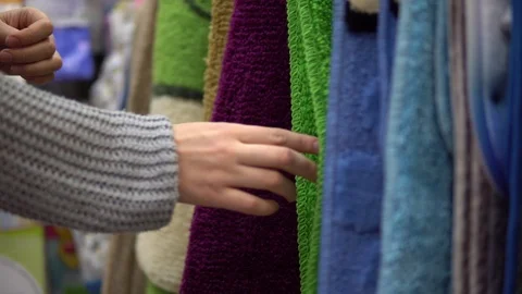 Someone chooses a color mat in the store. Stock Footage 89959518
