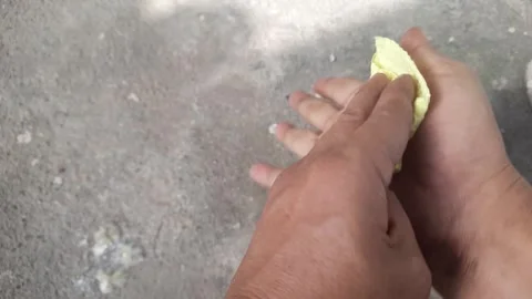 Someone Cleans his hands using a tissue Video stock 246865551