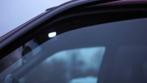 Someone closes and opens the window in the car Stock-Footage 122262132