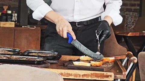 Someone is cooking a meal with a. Stock Footage 282662499