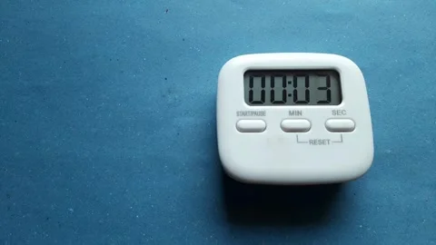 Someone counts time with a timer up to 10 seconds	 Stock Footage 285910862