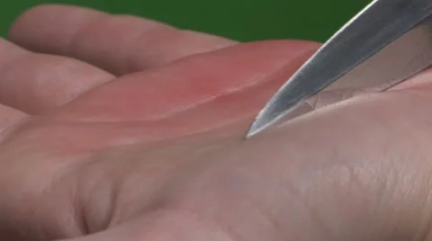 Someone cutting themselves. closeup. Video stock 49861680