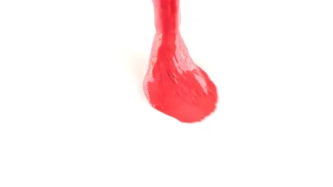Someone draws paint on a white sheet. close-up of a tassel. 4k, slow motion Stock Footage 82454100