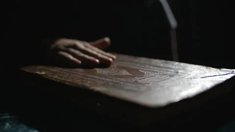 Someone is dusting a book Video stock 99082614