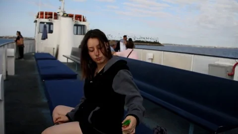 Someone eats peanuts on boat Stock Footage 83129362