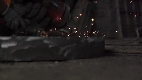 Someone is grinding iron with a grinder Stock Footage 259862885