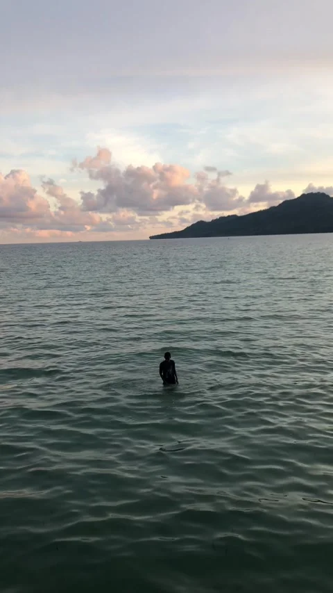 Someone Having Fun on A Sea During Sunset in Ambon, Indonesia 1 Stock Footage 239632688