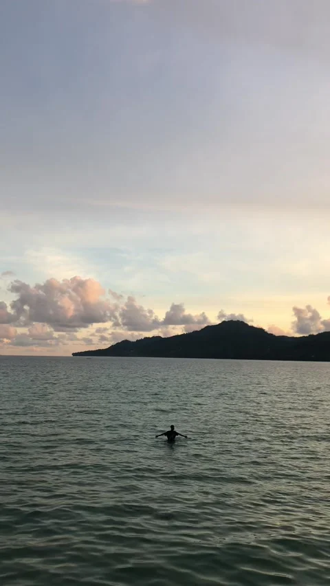 Someone Having Fun on A Sea During Sunset in Ambon, Indonesia 2 Stock Footage 239632691