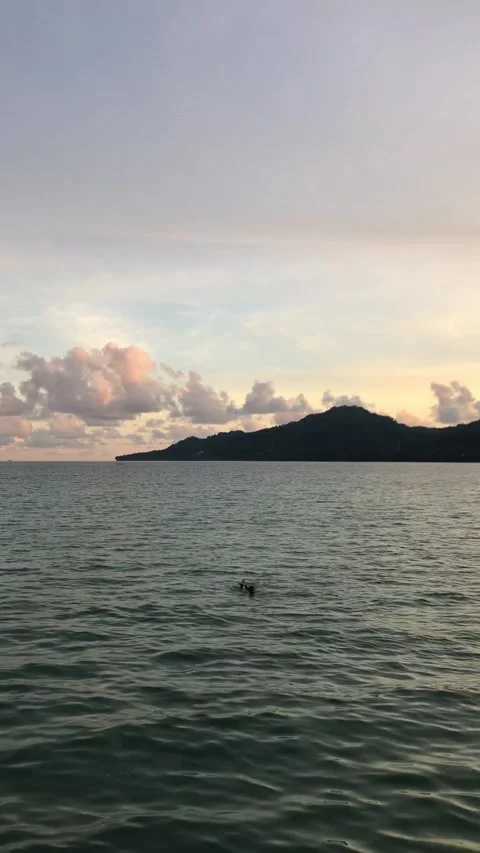 Someone Having Fun on A Sea During Sunset in Ambon, Indonesia 3 Stock Footage 239632701