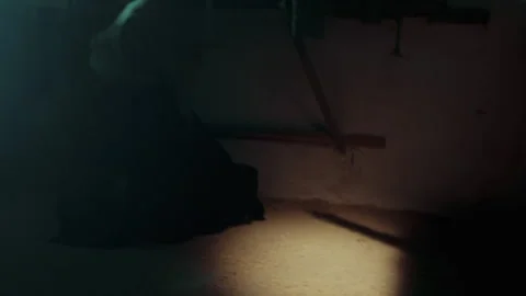 Someone held captive in the dark Stock Footage 259858959