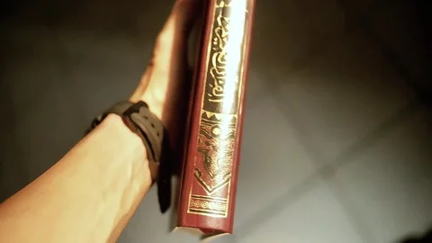 Someone hold Quran Stock Footage 289921778