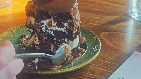 Someone is holding a spoon over a. Video stock 282682301