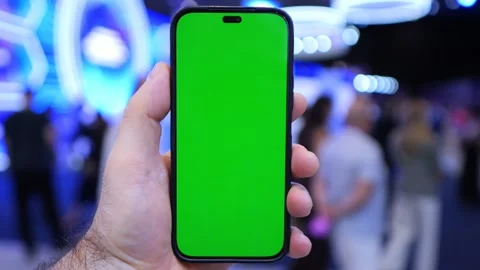 Someone holds a device with green screen Stock Footage 344994520