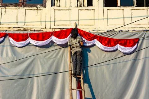 Someone is installing Indonesian flag in Kota Tua Jakarta Stock Photos