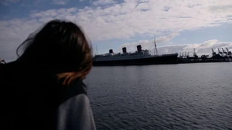 Someone looks at the Queen Mary ship Stock Footage 83036601