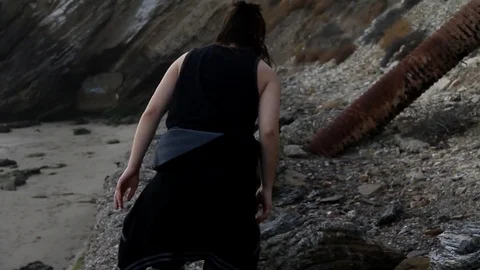 Someone looks for rocks on wall side. Stock Footage 83161793
