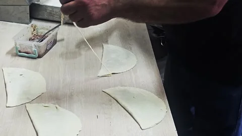 Someone is making a pastry with a. Stock Footage 282658620