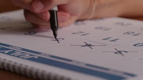 Someone Marks Off the Days on a Calendar with a Sharpie Stock Footage 270289345