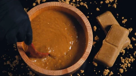 Someone is mixing curry with a spoon. Stock Footage 113031090