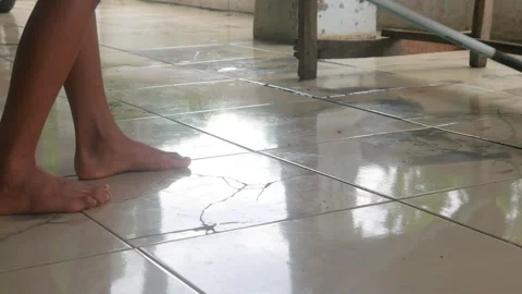 Someone is mopping the dirty ceramic Stock-Footage 327190414