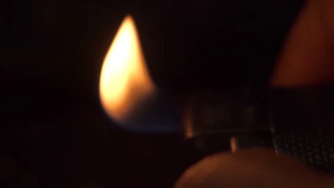 Someone playing with a gas lighter Stock Footage 205565874