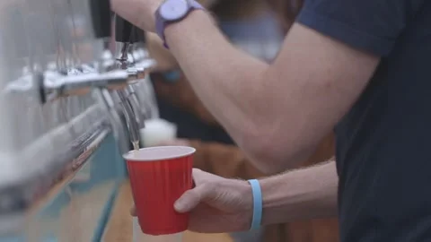 Someone pouring from beer tap van. Stock Footage 247331234