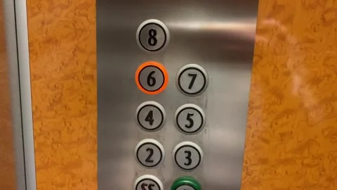 Someone pressing the 6th floor button in an elevator Video stock 261856755