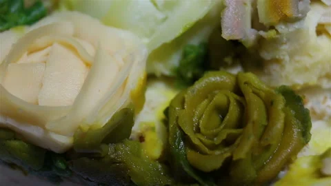 Someone puts a cream rose back on the cake. Confectionery Floristics, edible cre Stock Footage 143597119