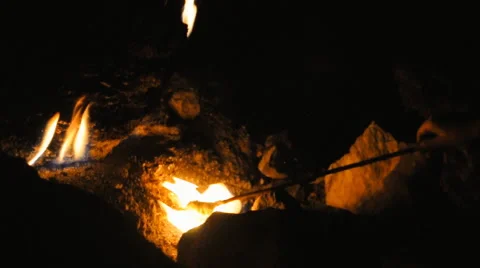 Someone roasted marshmallow on fire Stock Footage 67681030