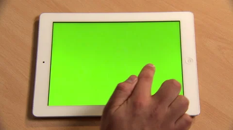 Someone Scrolling Left on Tablet with Brief Pauses Stock Footage 49117444
