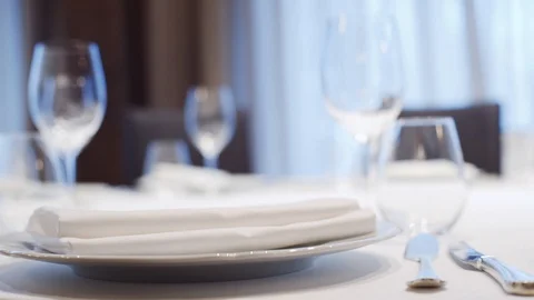 Someone is setting the table in an Italian restaurant. Stock Footage 113848134