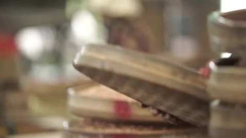 Someone is sorting nuts in the traditional way Stock Footage 259270905